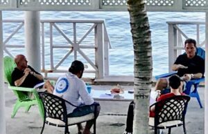 "Nick Avante and staff lead a men's orientation session under the beach portico at the Avante Institute Bahamas."